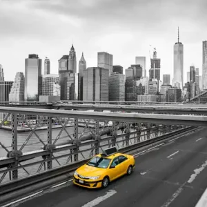 Fototapeta Taxi Crossing Brooklyn Bridge Niska cena